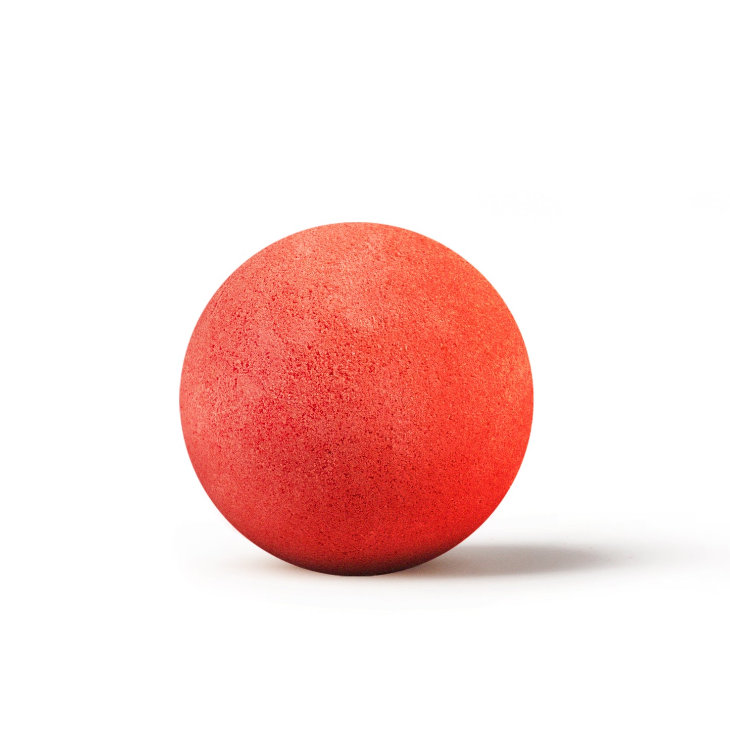 a red bath bomb with shadow