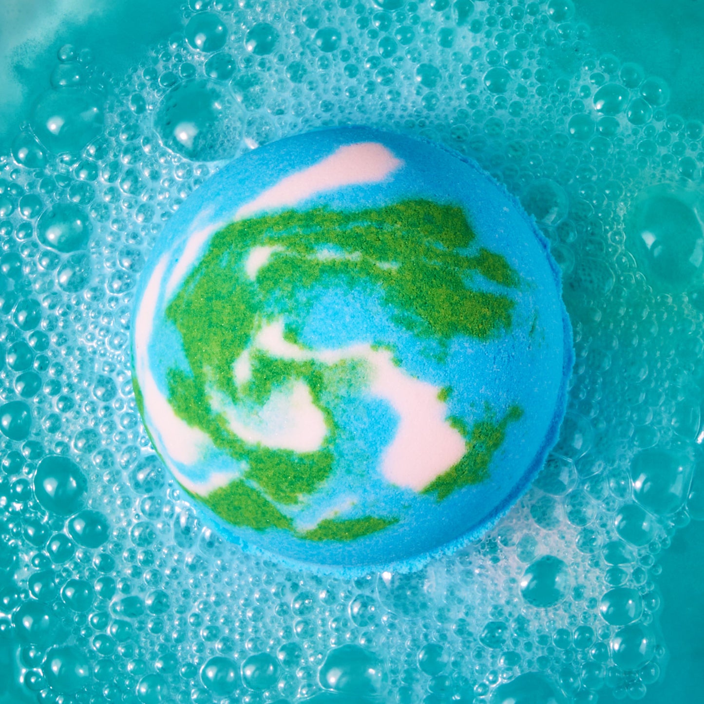 blue earth bomb fizzing in blue water