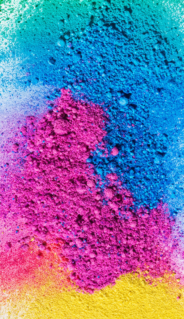 pink, blue and yellow dye powder