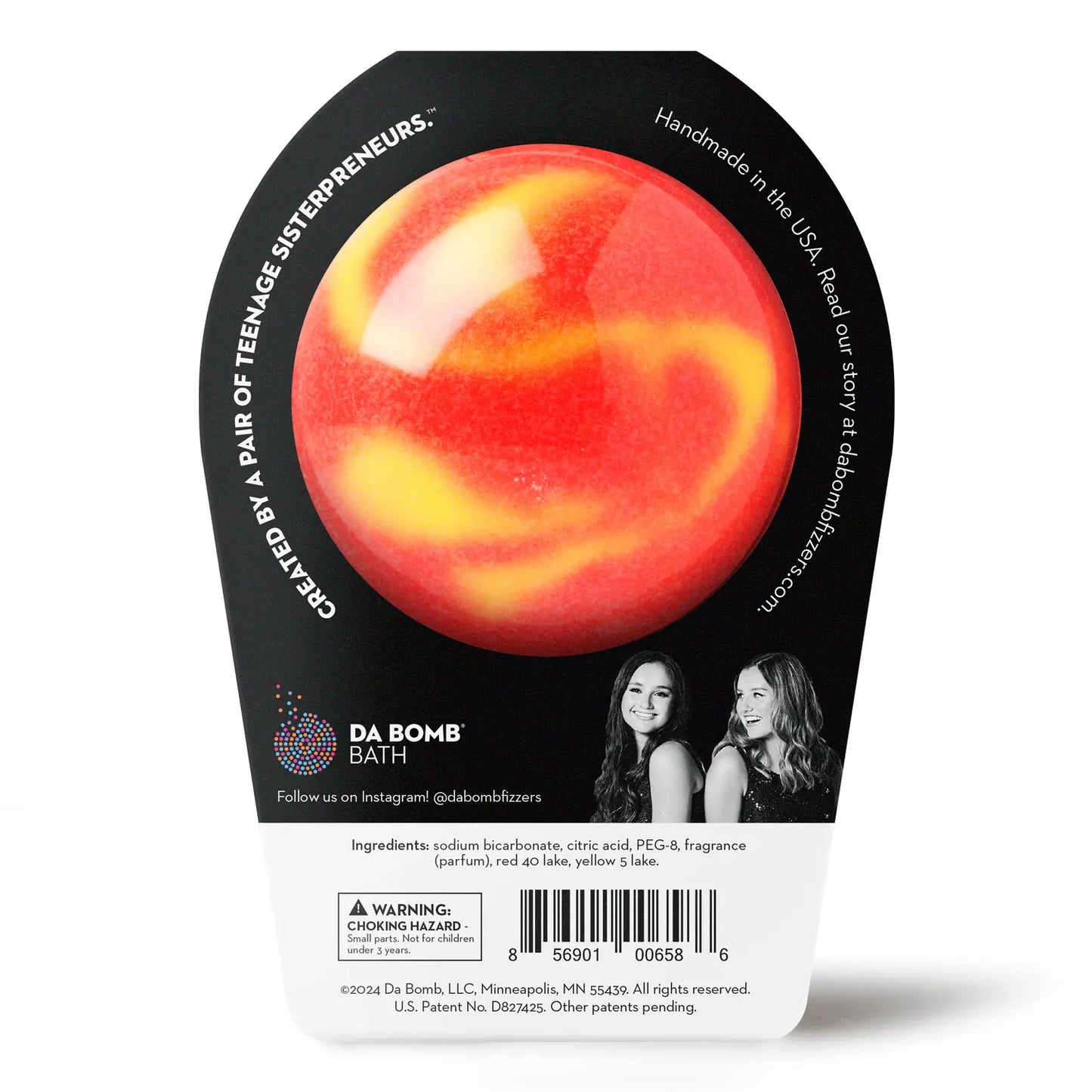 a red bath bomb with yellow swirl in black packaging