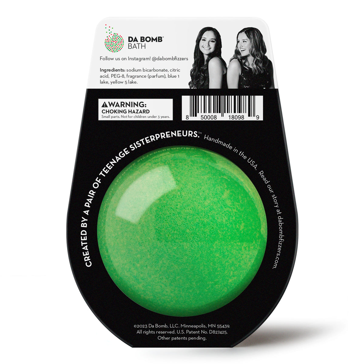 back of a green bath bomb in a black packaging
