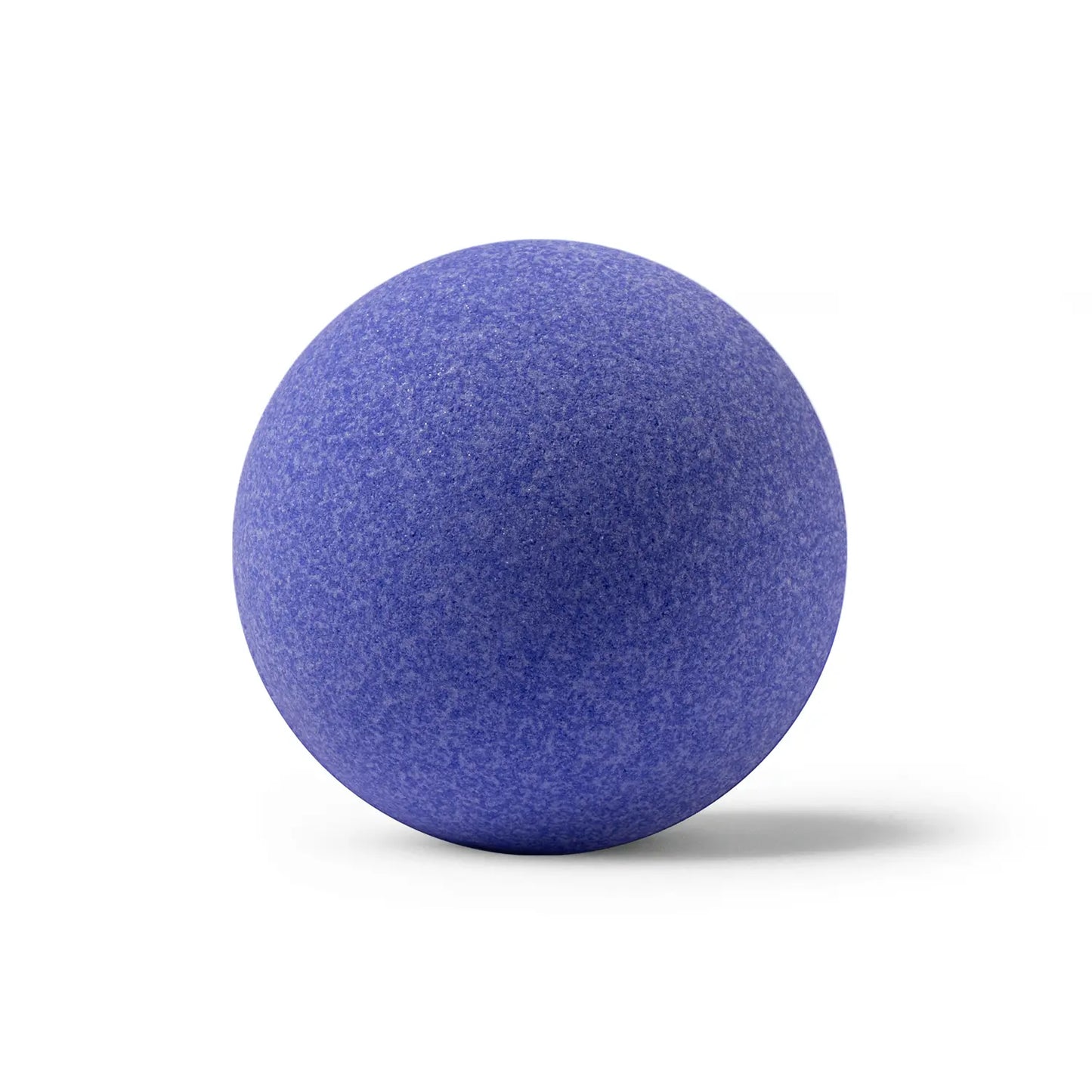Purple bath bomb on white background with shadow