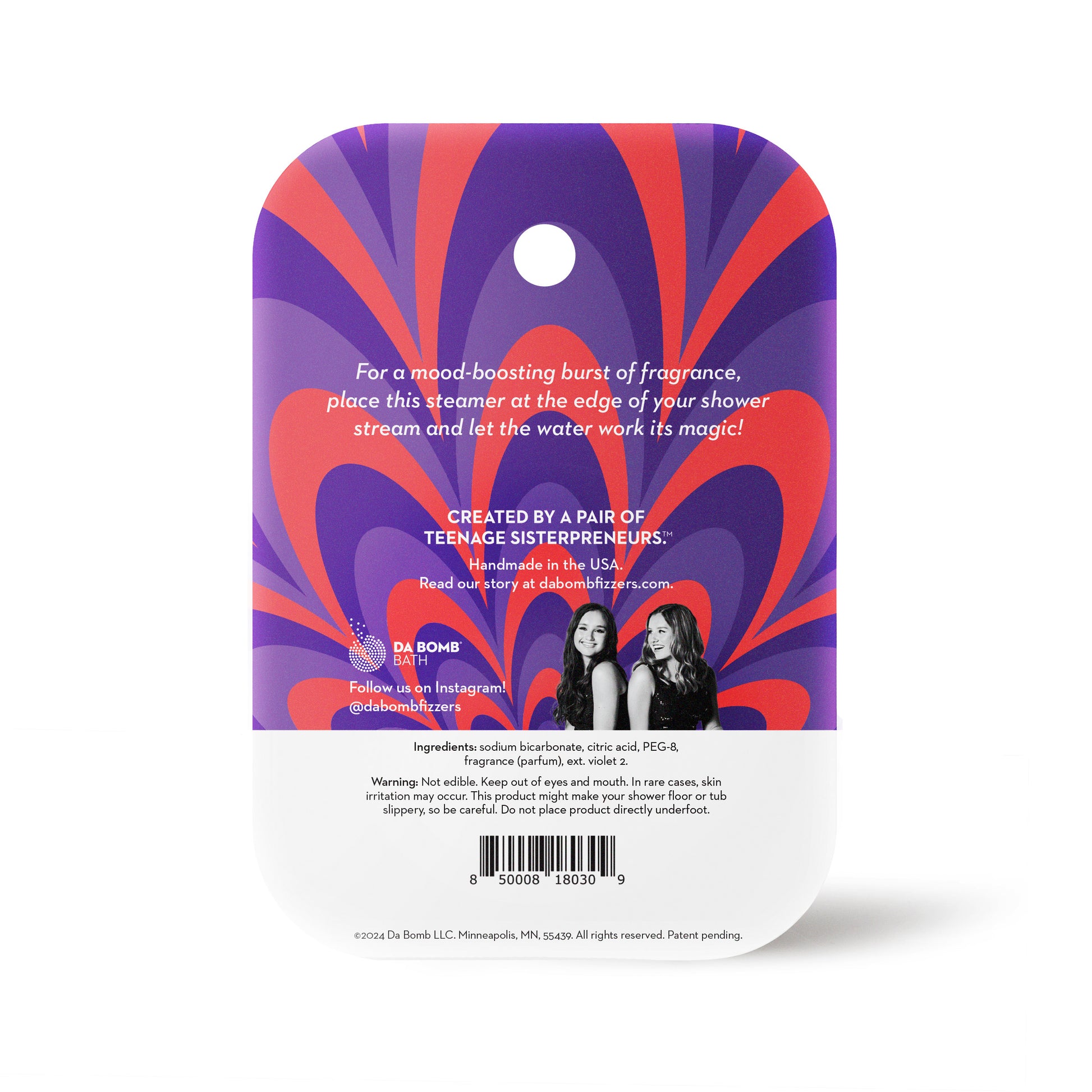 back of a purple lavender shower steamer in purple and red packaging