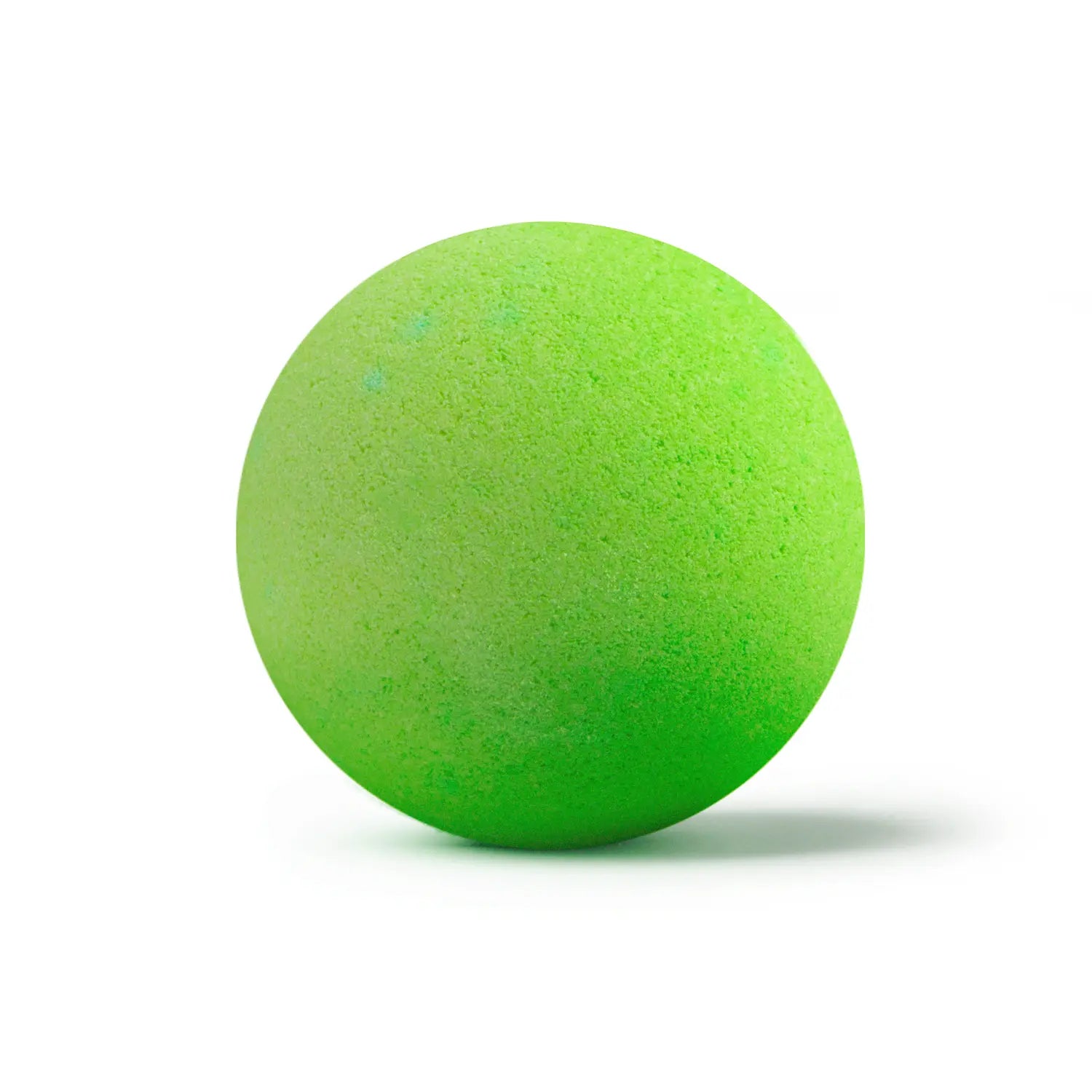 a bright green bath bomb with shadow