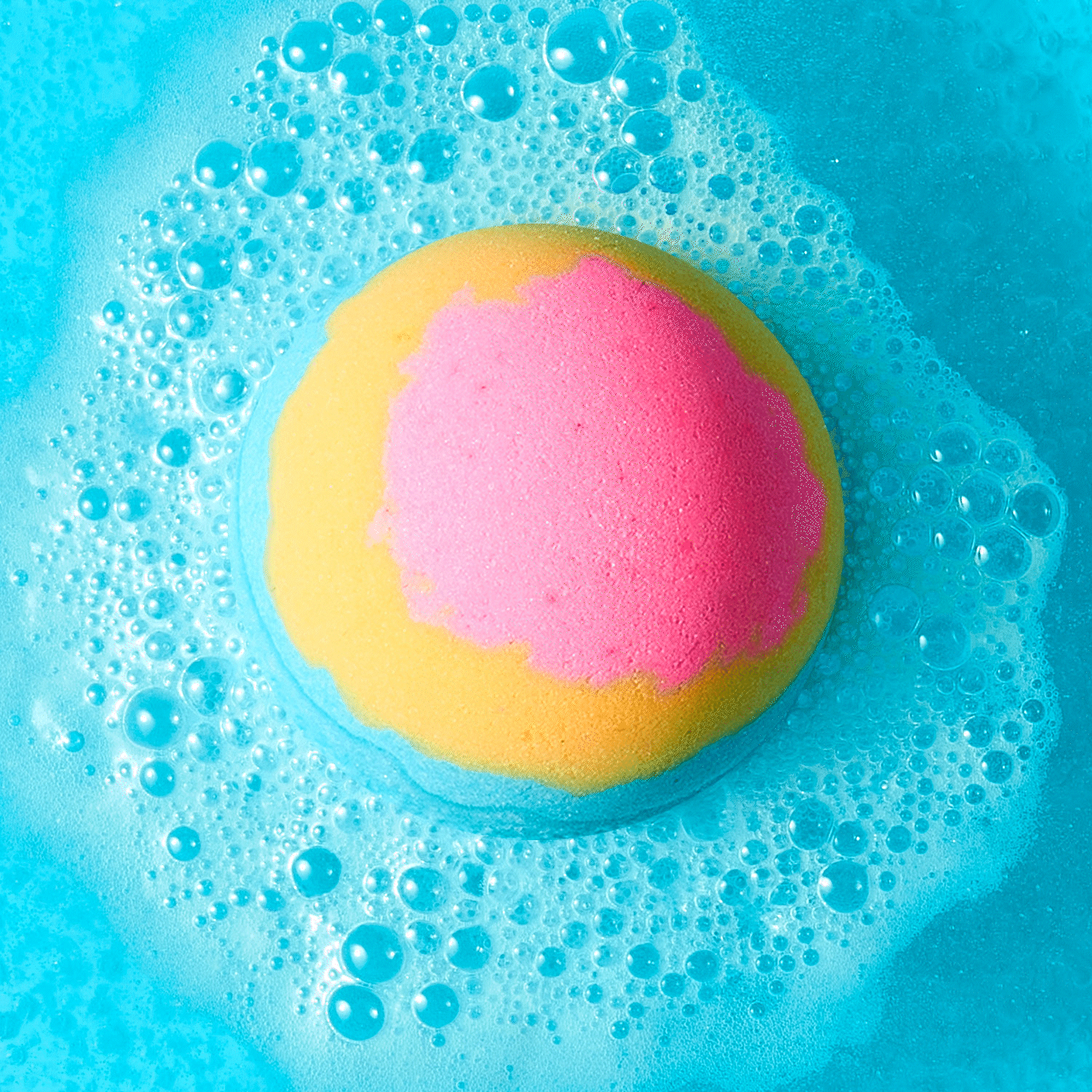 animated gif of flower bath bomb fizzing in water