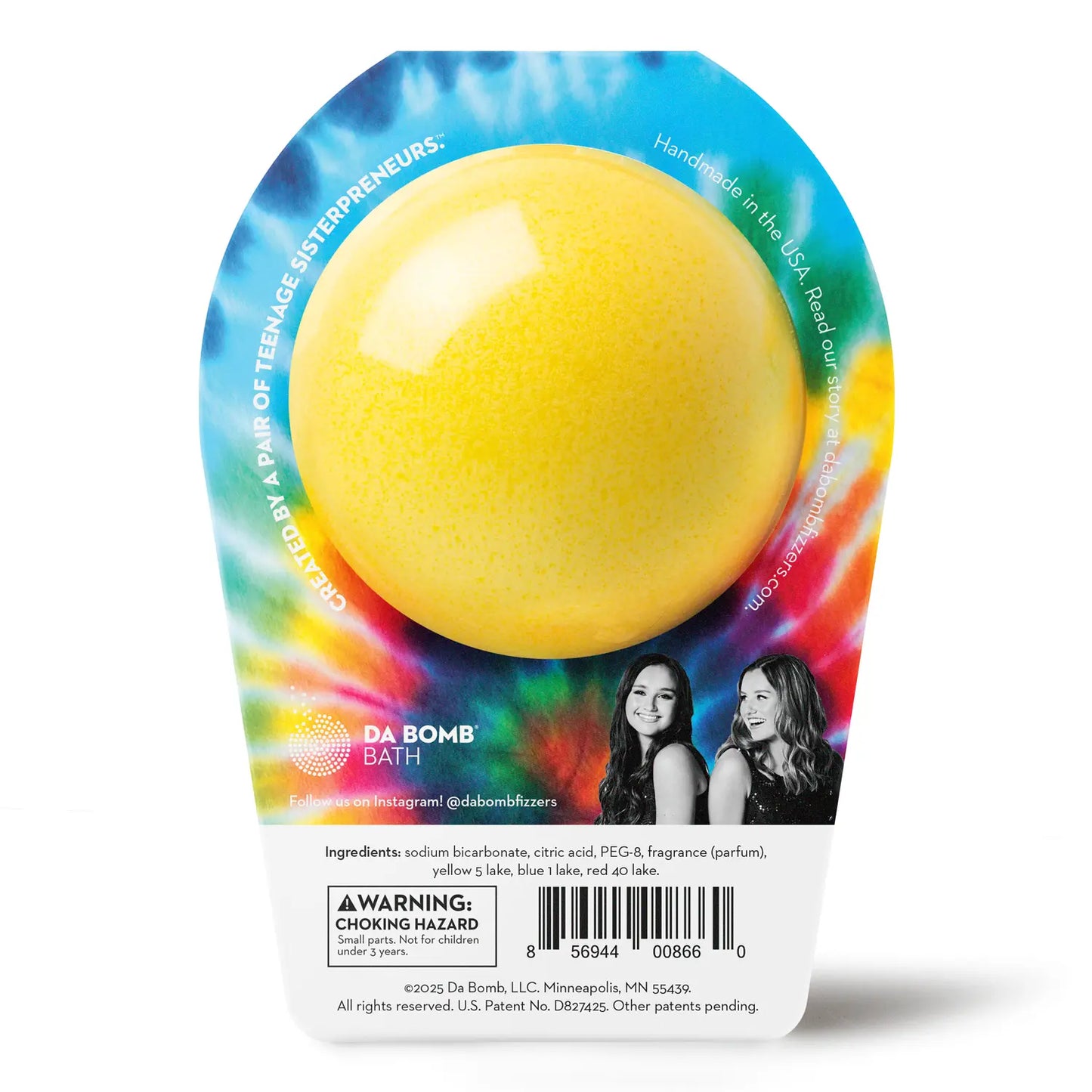 back of a yellow bath bomb with red and blue dots in tie dye colored packaging