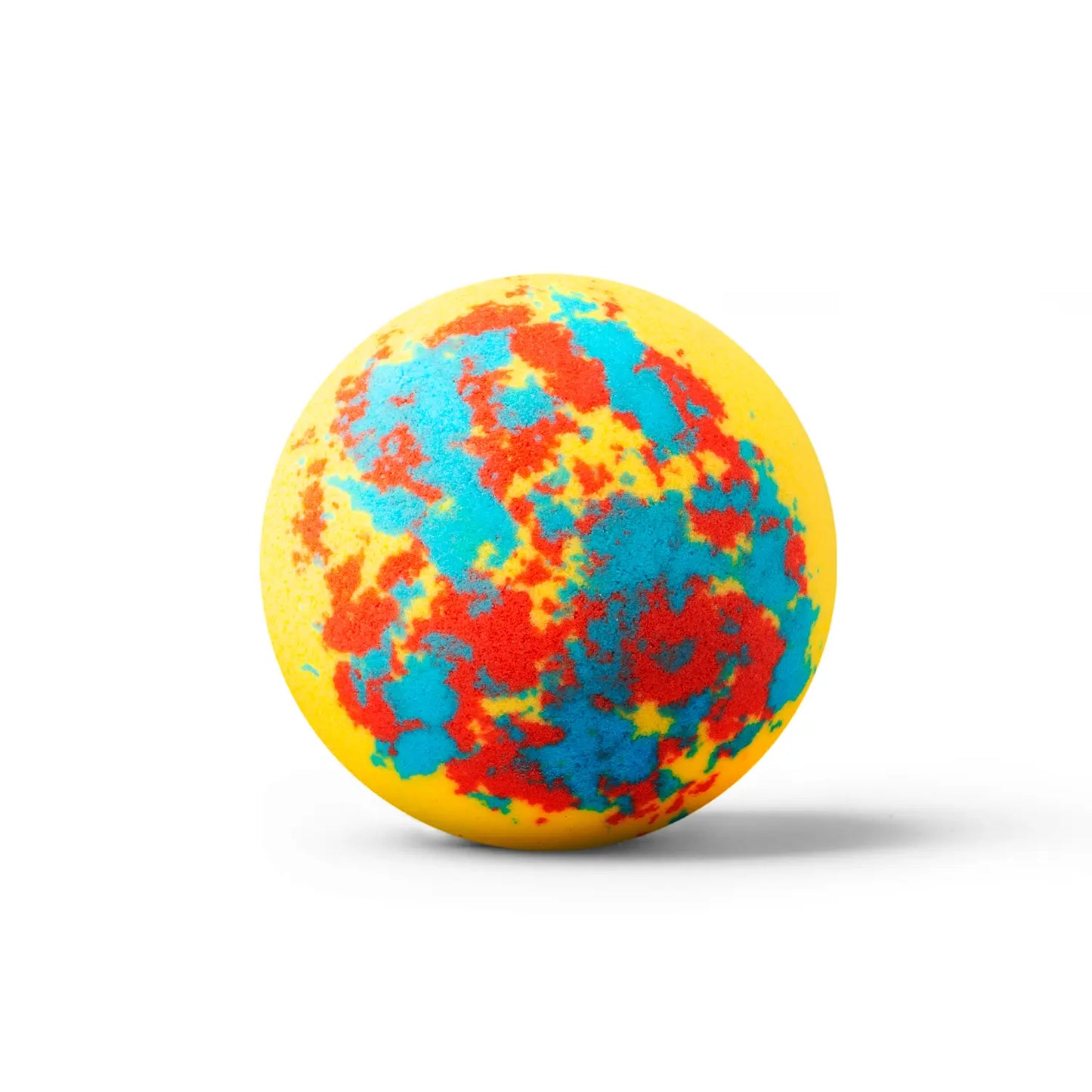a yellow bath bomb with red and blue dots