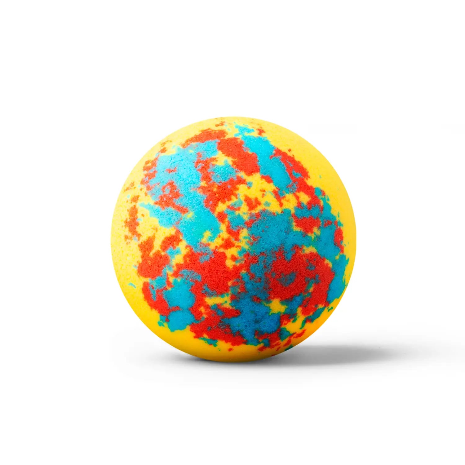 a yellow bath bomb with red and blue dots