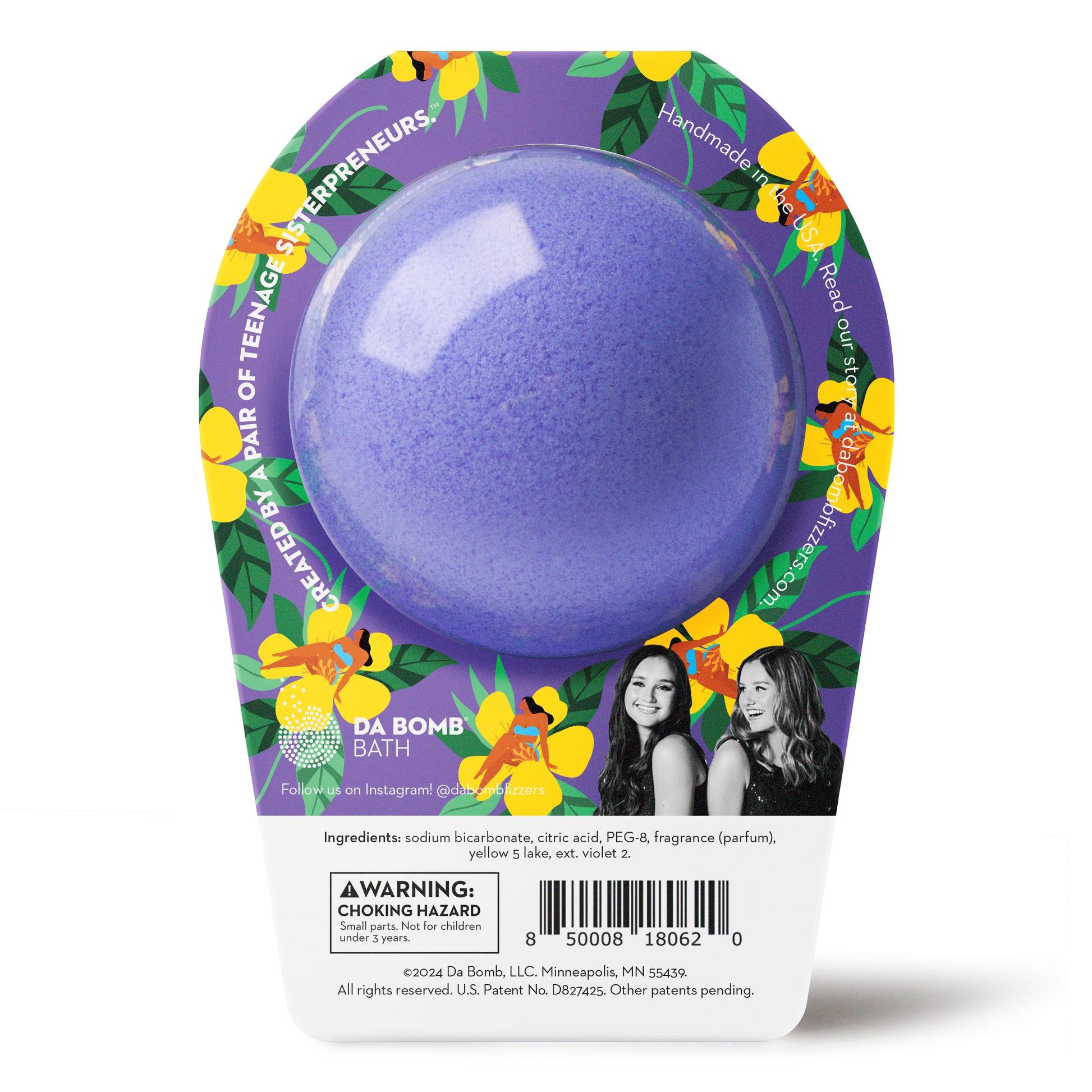 a purple and yellow bath bomb in luaus themed packaging