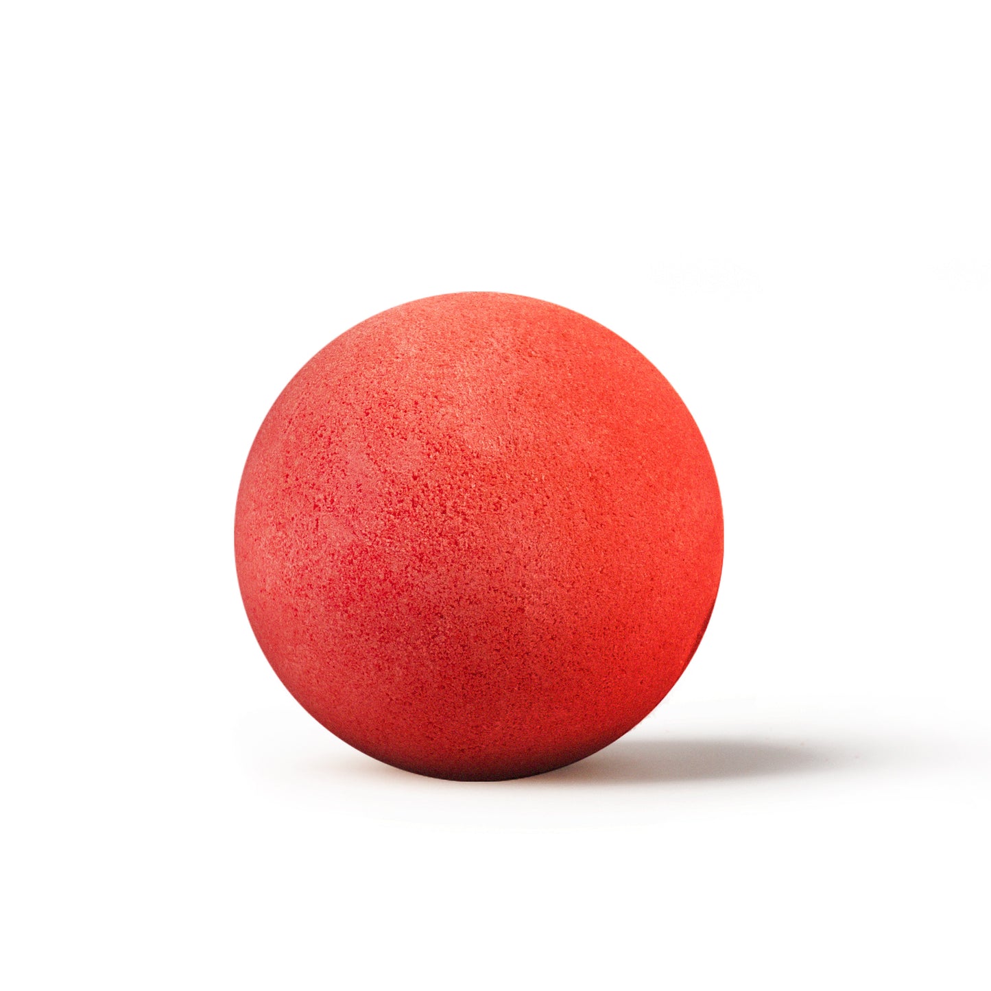 a red bath bomb with shadow