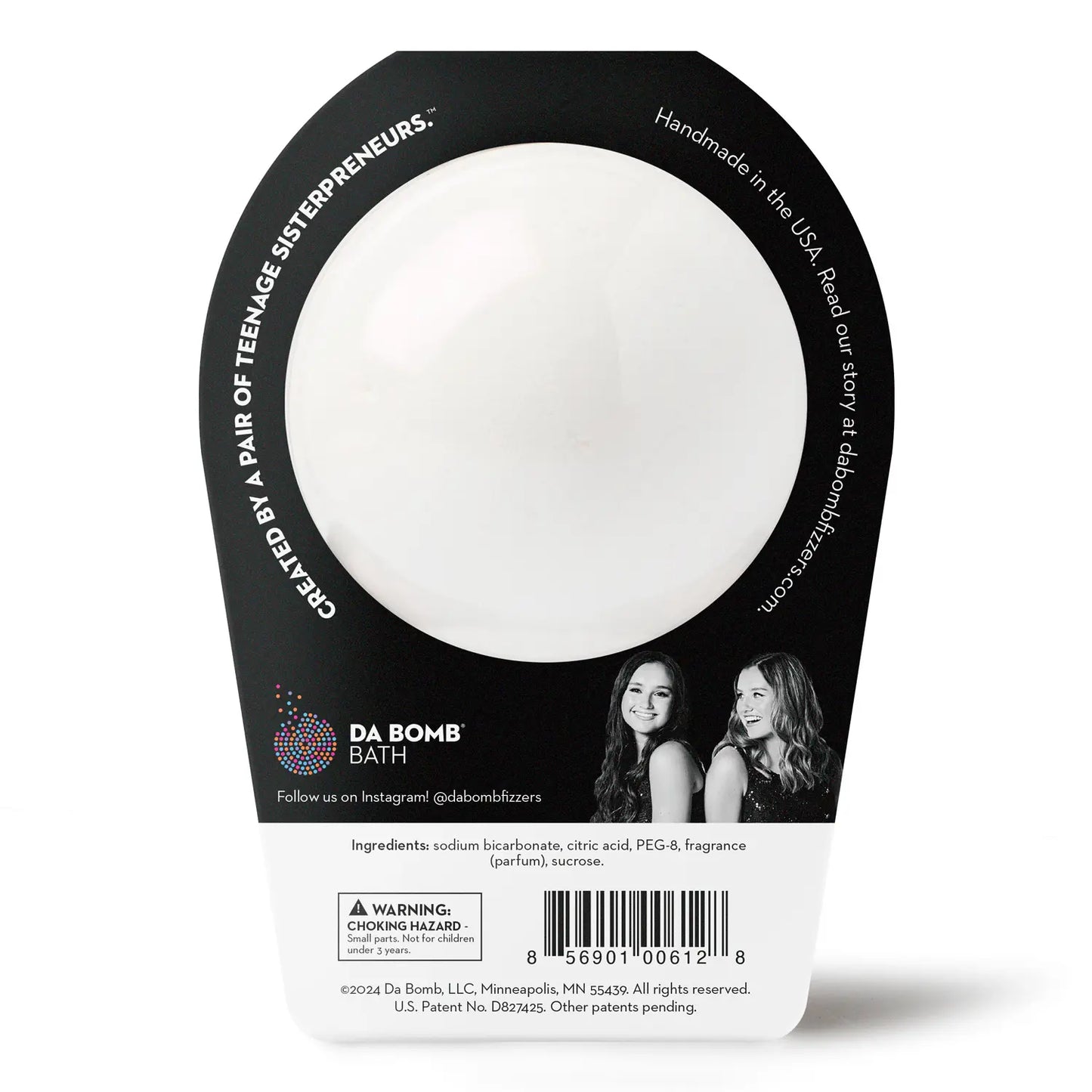 back of white bath bomb in black packaging