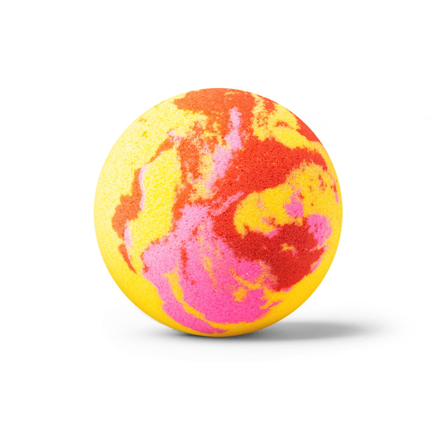 Yellow bath bomb with red and pink swirls on a white background with shadow