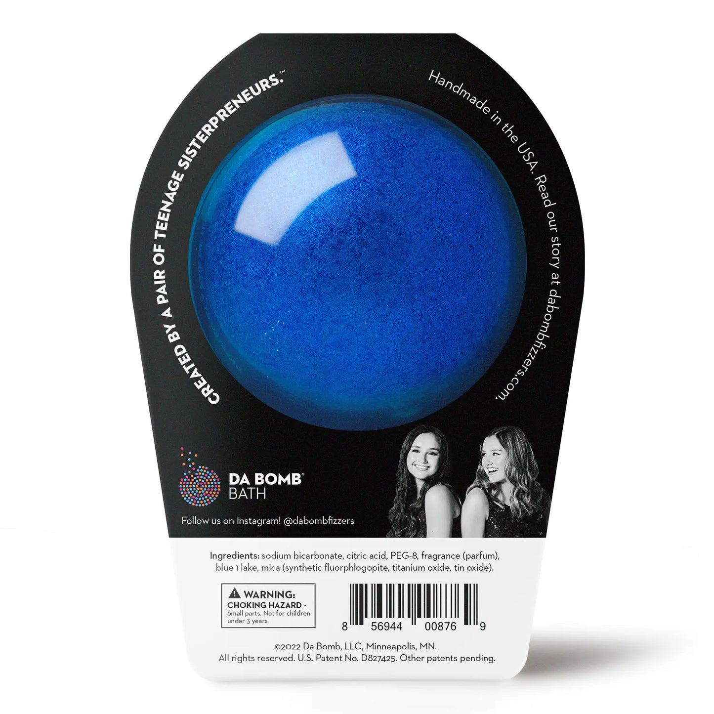 back of a dark blue bath bomb in black packaging