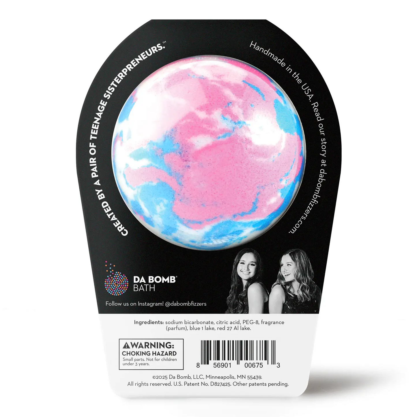 back of a blue, pink and white bath bomb in black packaging