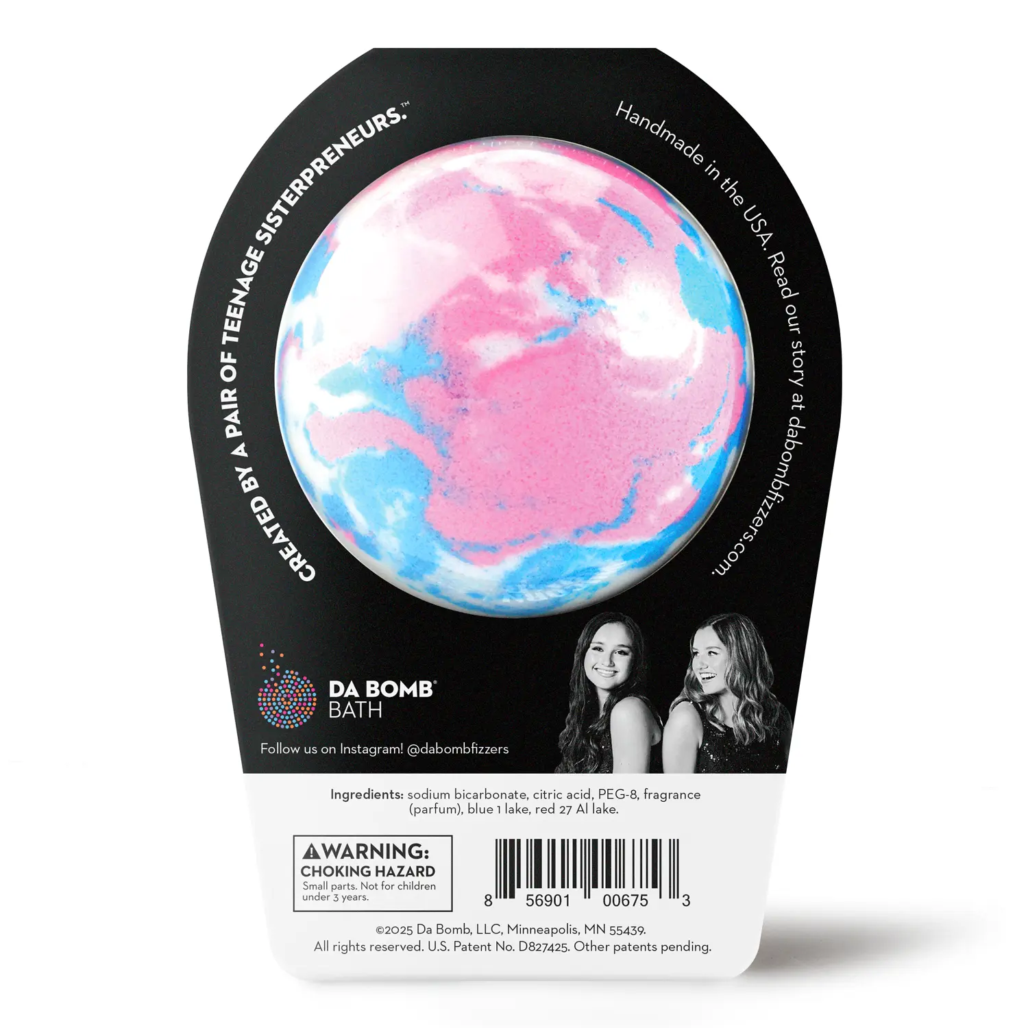 back of a blue, pink and white bath bomb in black packaging