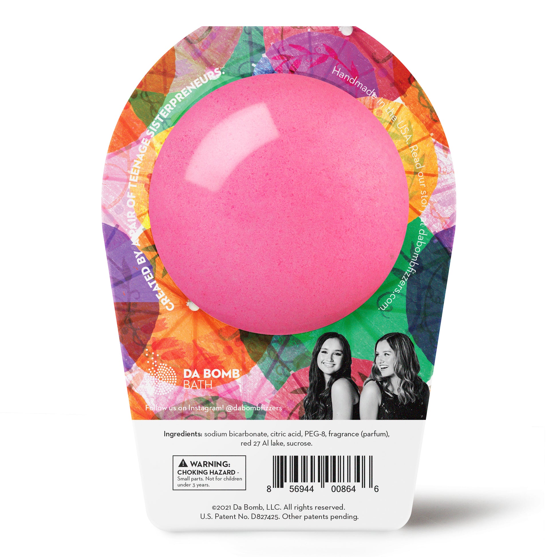back of a pink bath bomb in bright packaging
