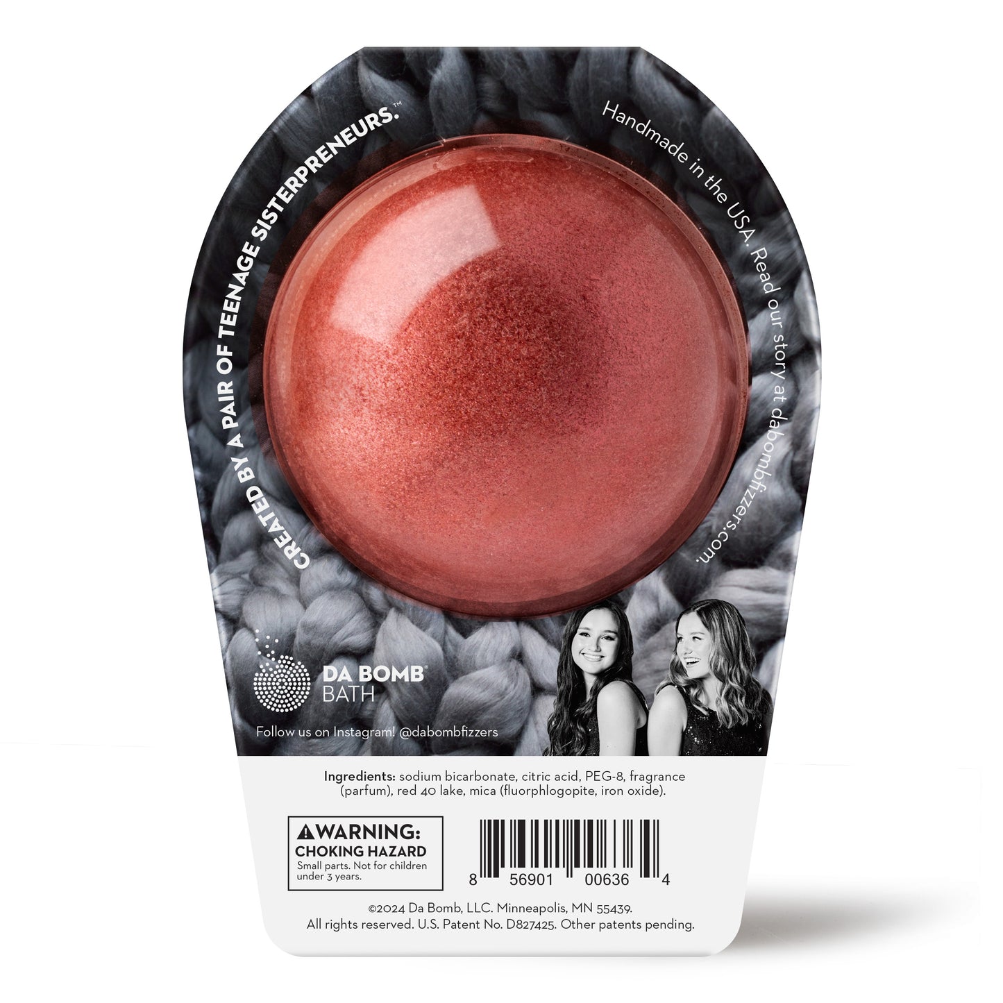 back of crimson glitter bath bomb in grey knit packaging