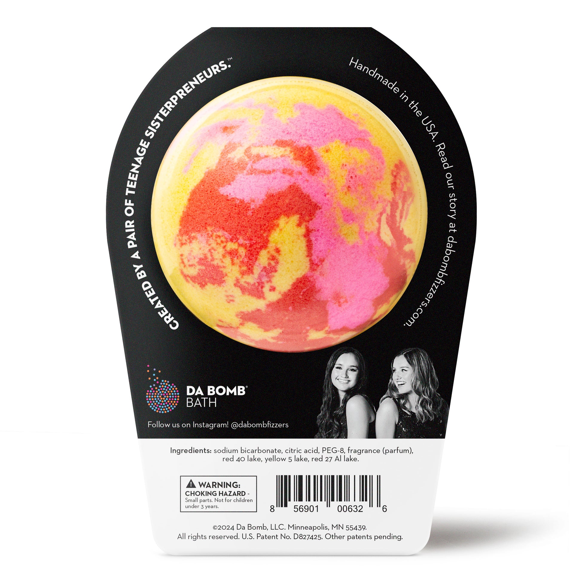 back of yellow bath bomb with red and pink swirls