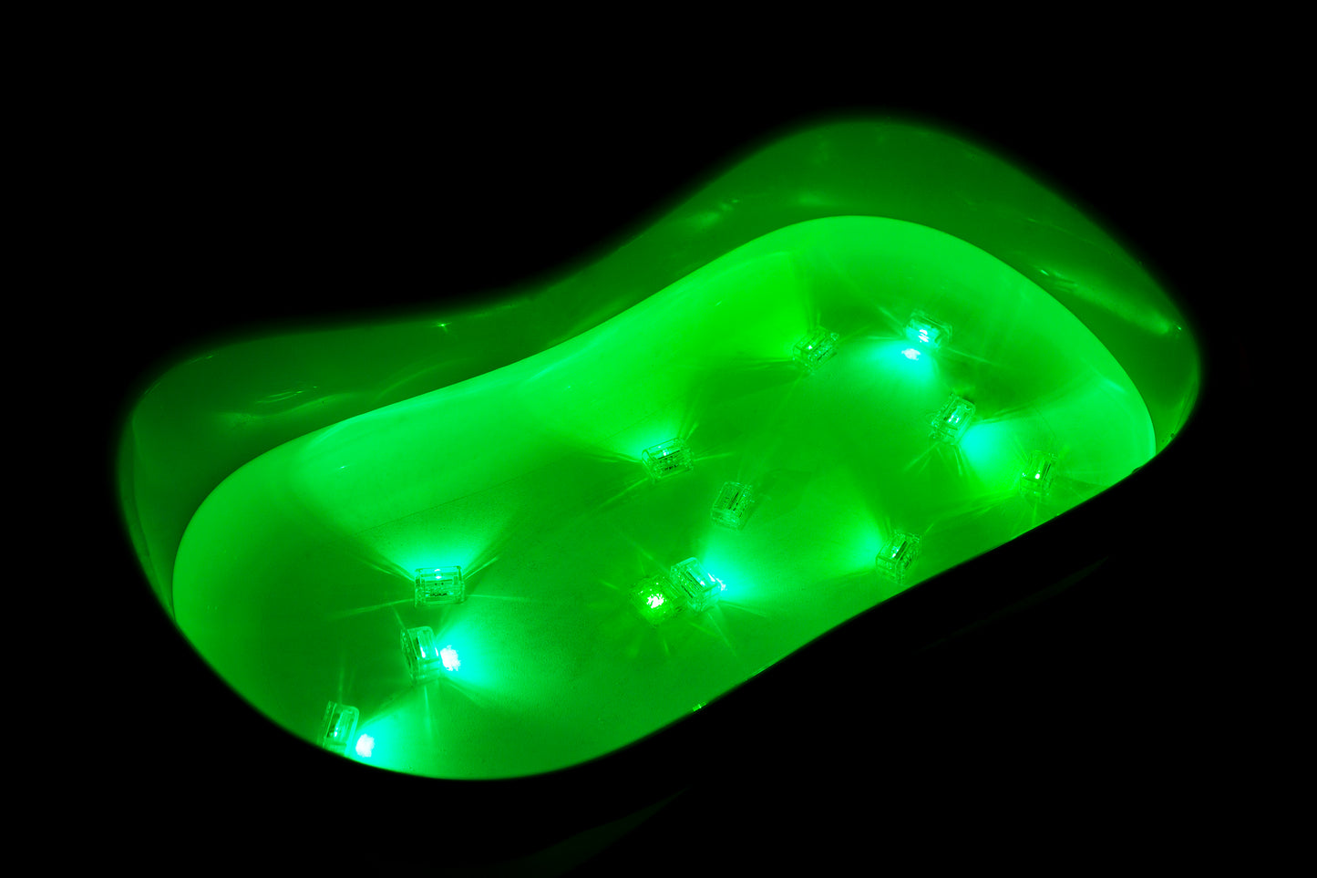 Bath tub lit up with glow cubes.