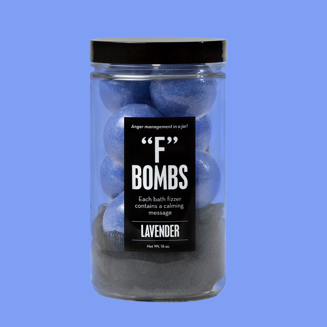 purple bath bombs in a jar on a lavender background