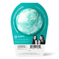 Back of the Ariel bath bomb in packaging. Bath bomb is white with teal swirl on the back.