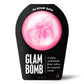 Product photo of a pink glam bath bomb in black packaging