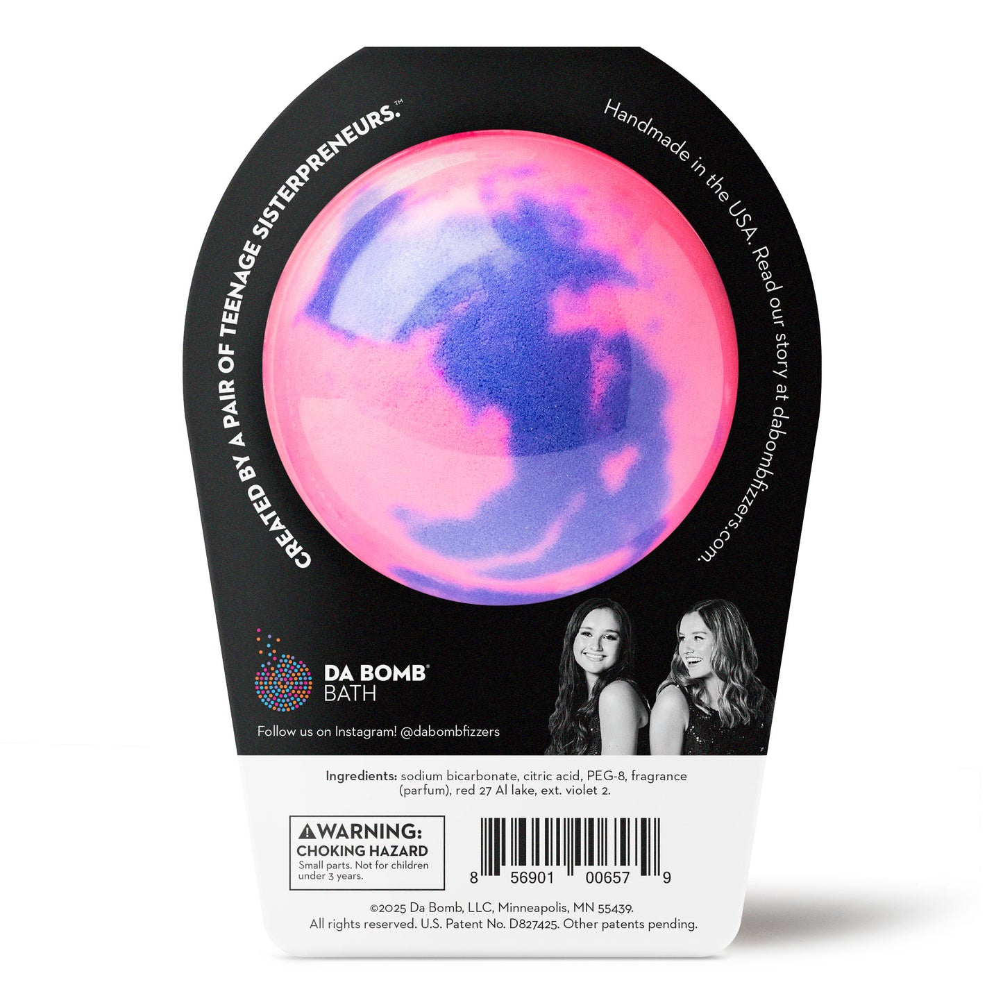 back of pink bath bomb with purple swirls in black packaging