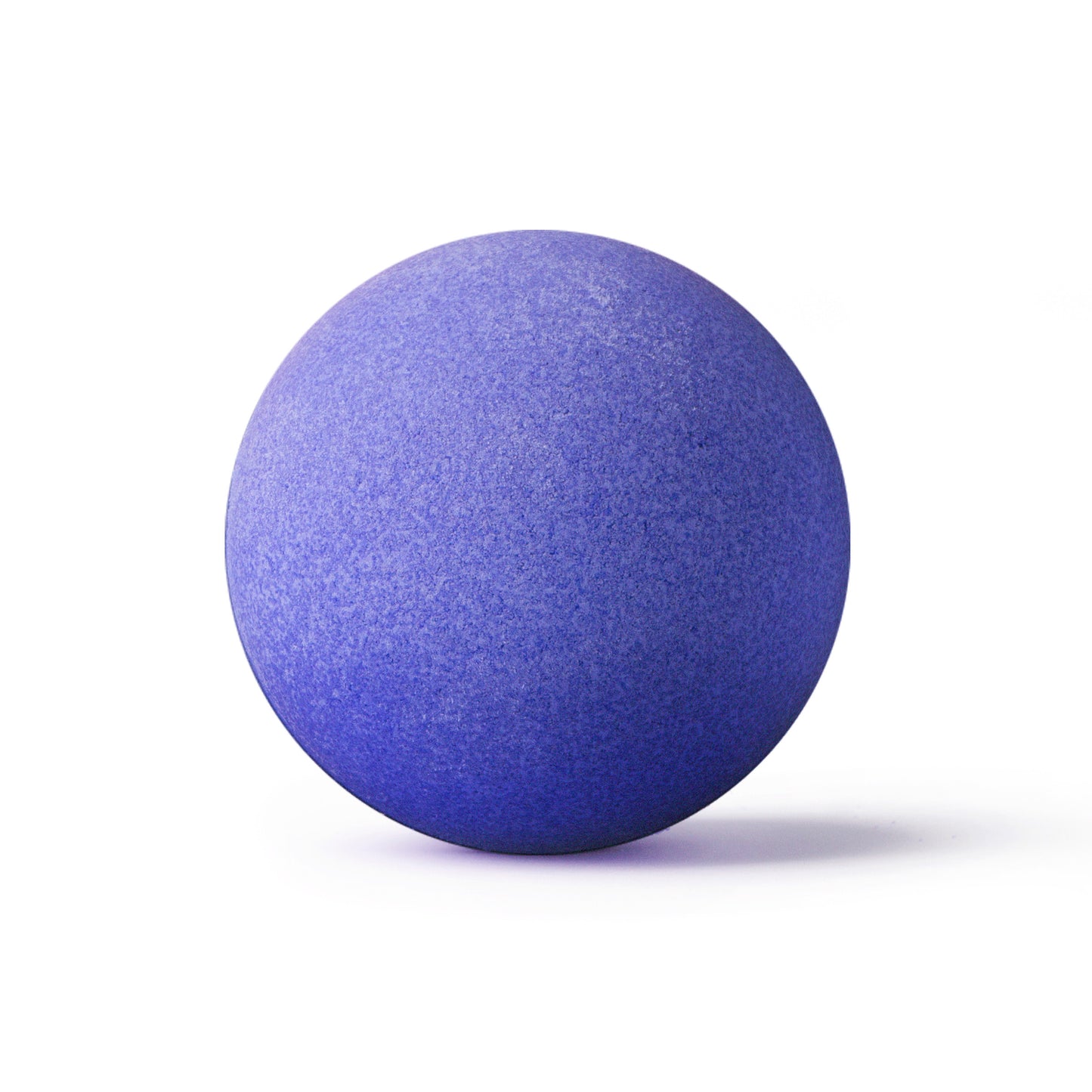 Purple bath bomb on white background with shadow