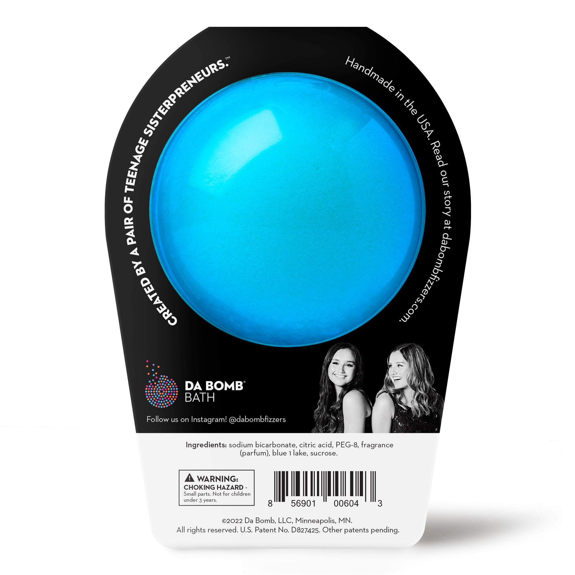 back of a blue bath bomb in black and white packaging