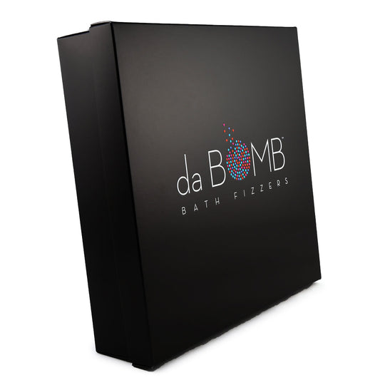 Black gift box with "Da Bomb" logo on the lid