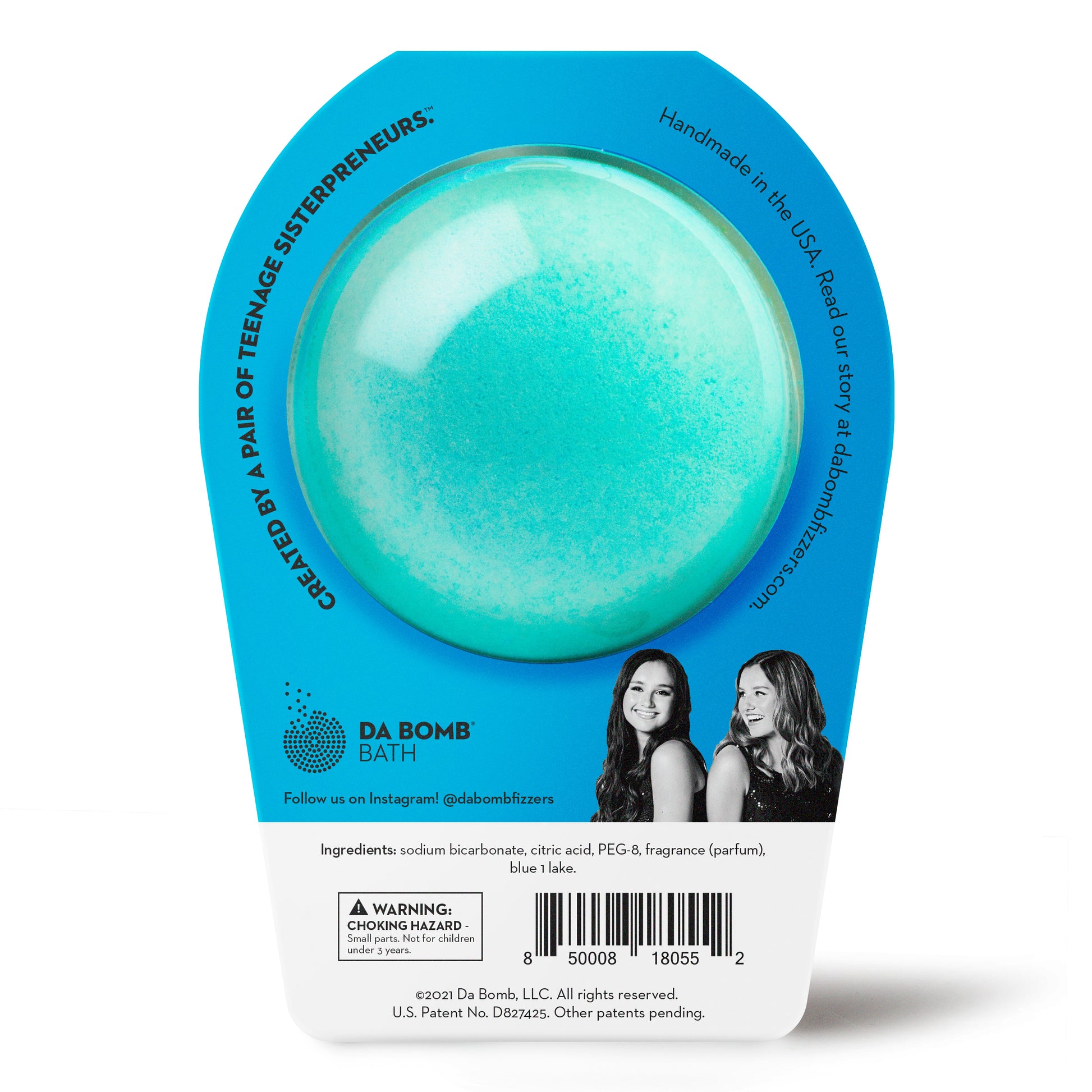 back of a light blue bath bomb in blue packaging