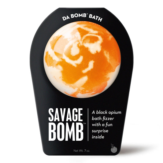 a white and orange bath bomb in black packaging