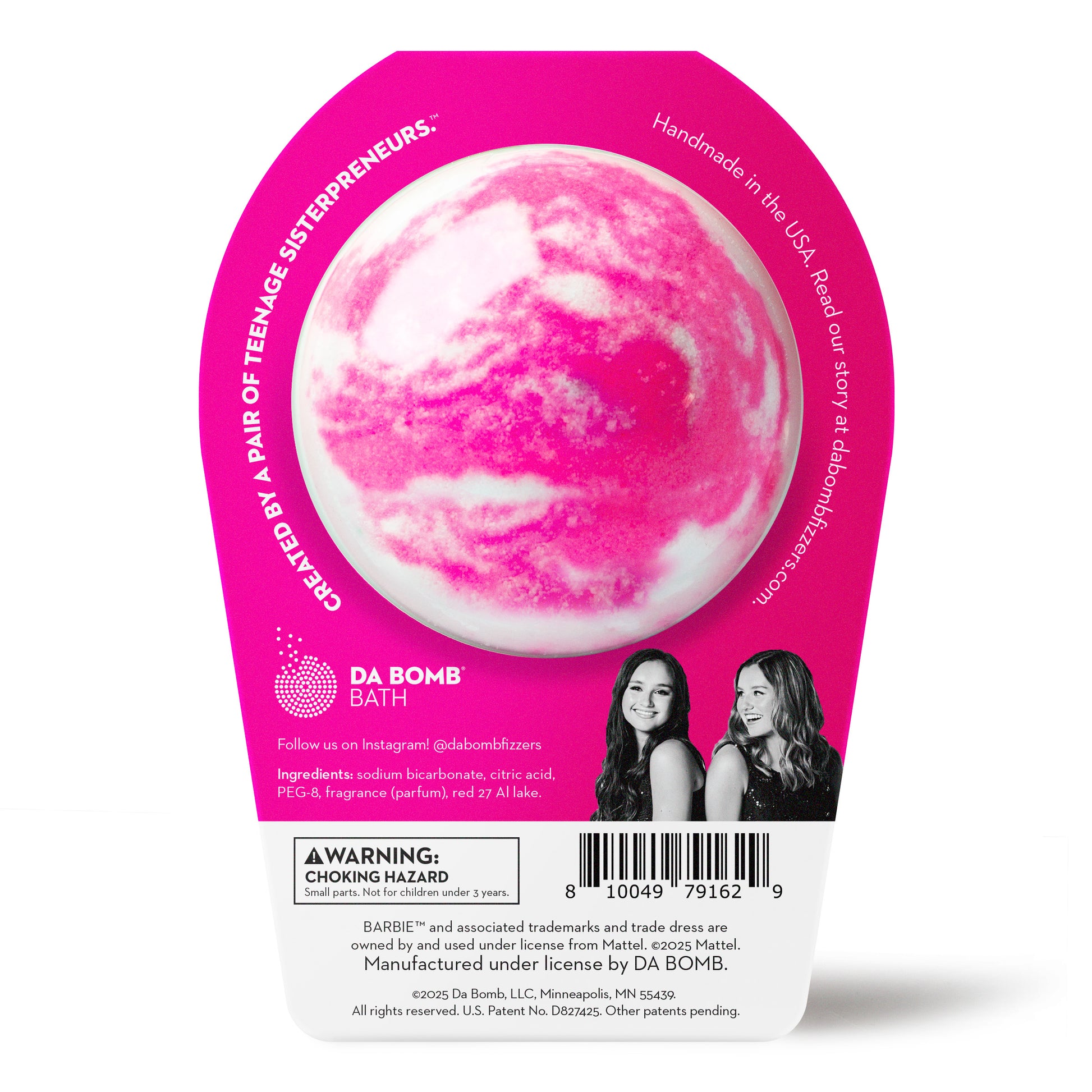 back of white bath bomb with pink swirls in barbie packaging