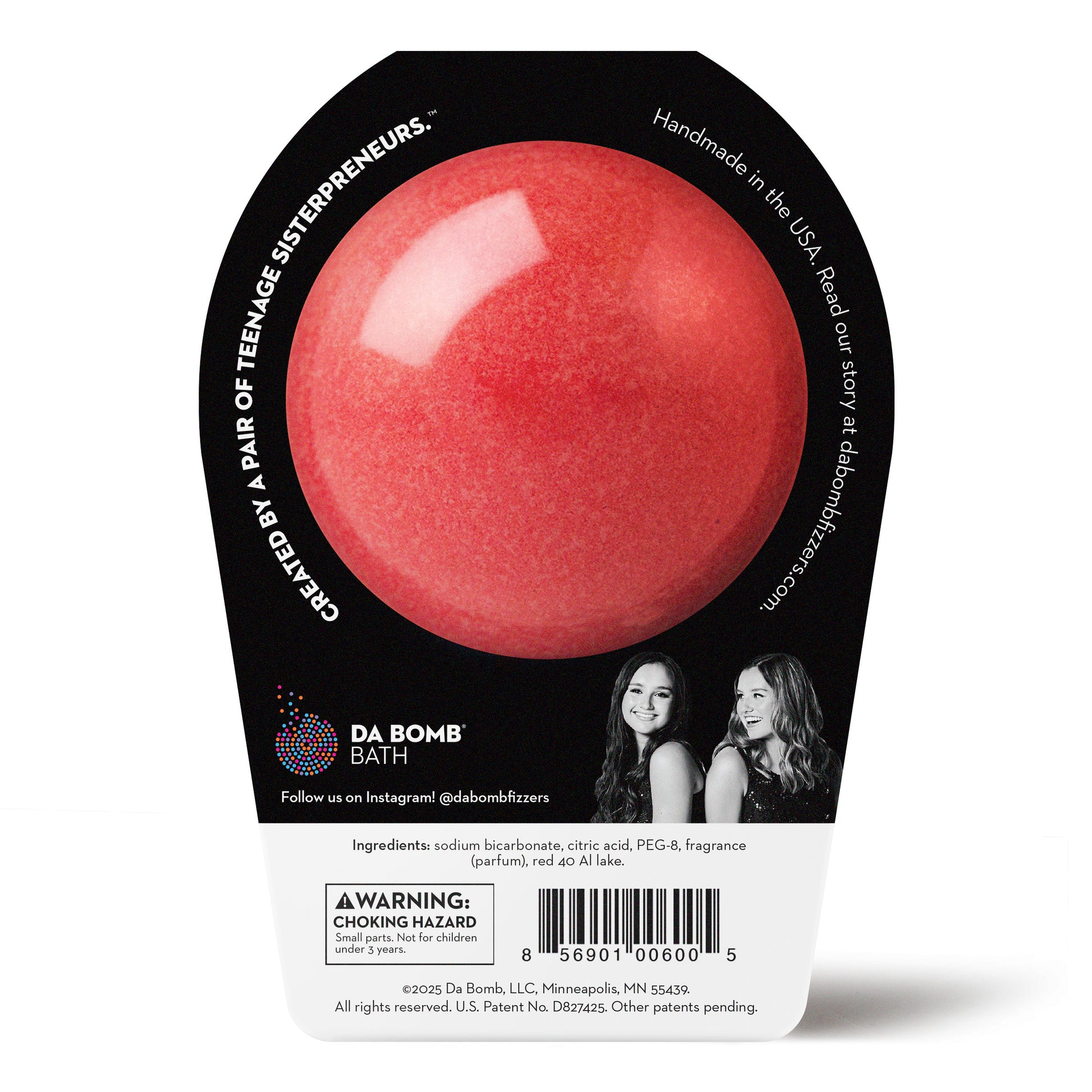 back of red cherry bath bomb in black packaging