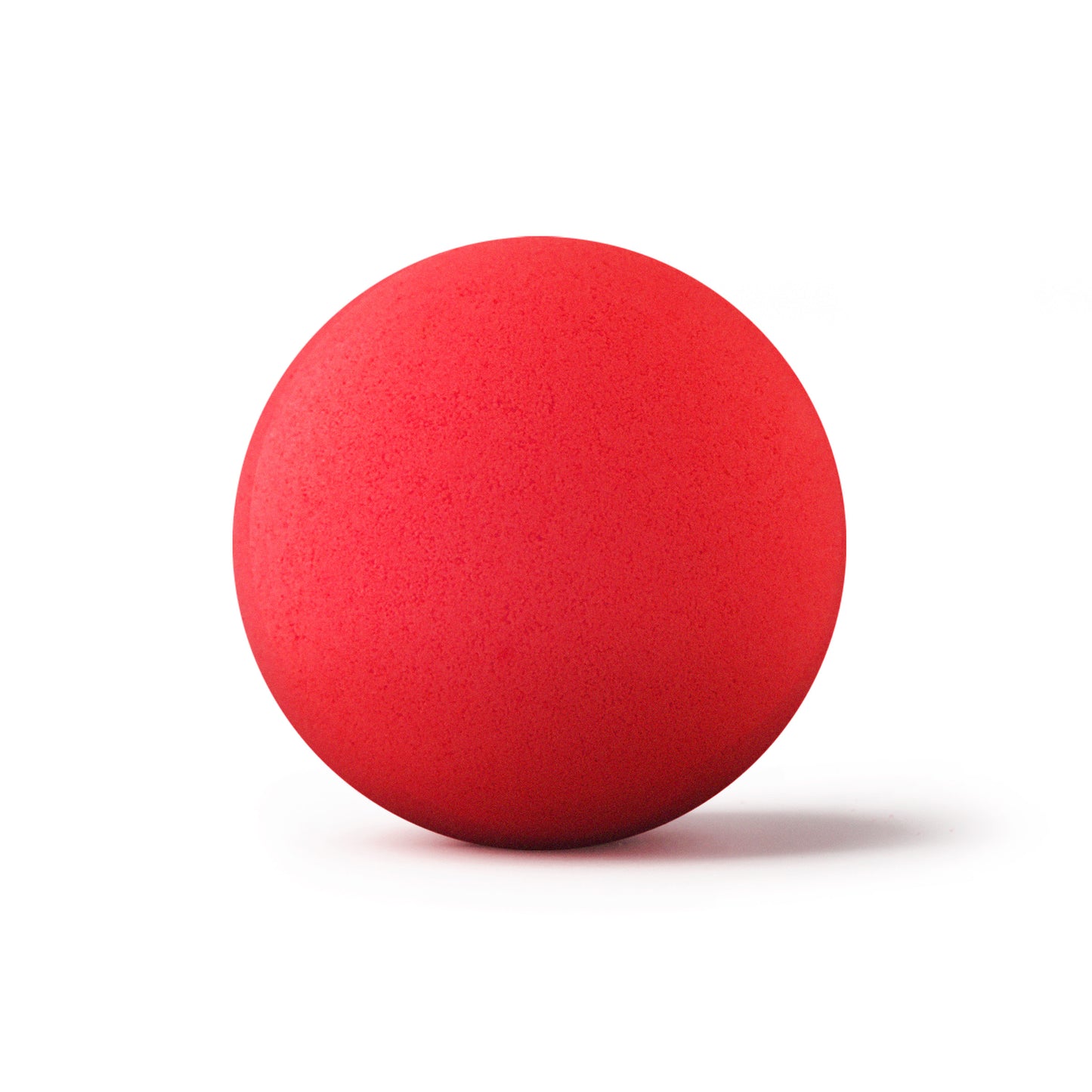 red cherry bath bomb on white background