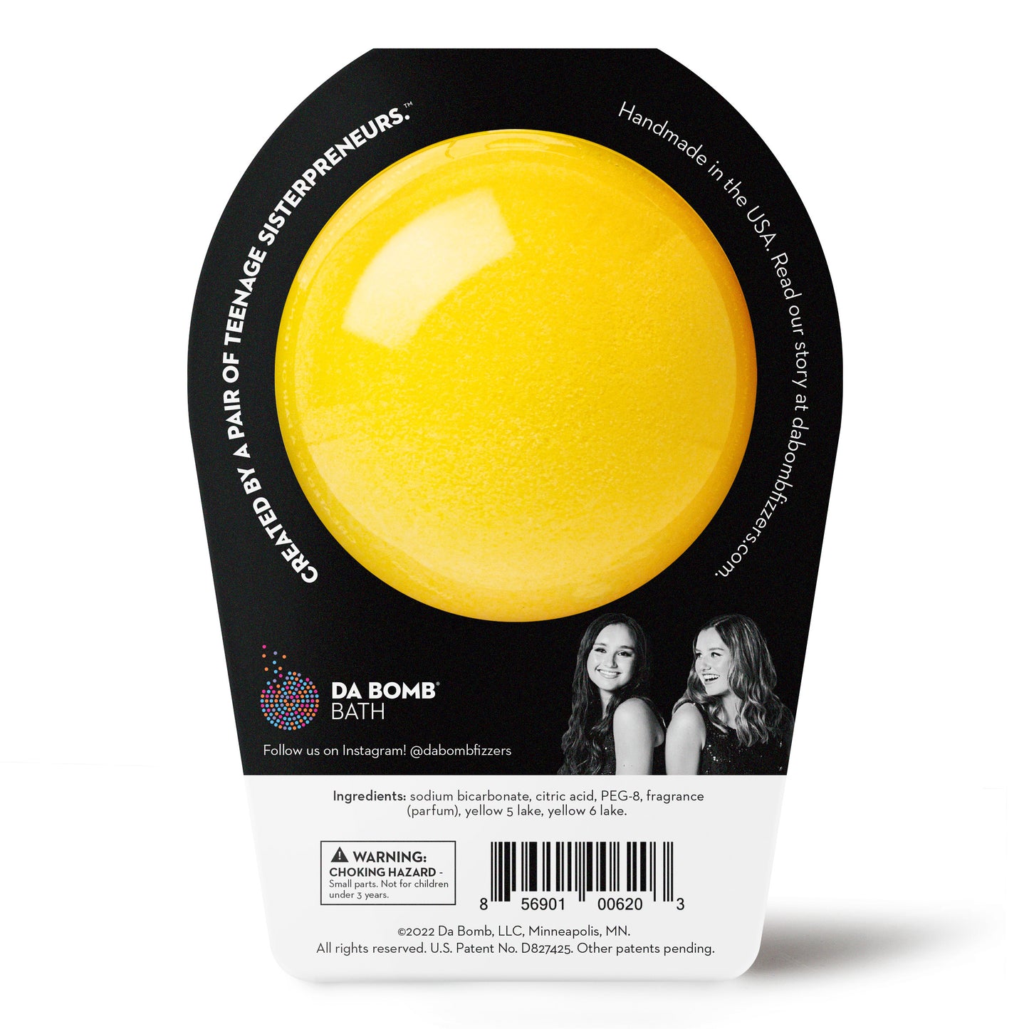 back of a yellow bath bomb in black and white packaging