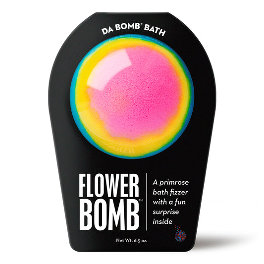 blue bath bomb with pink and yellow circles in black packaging