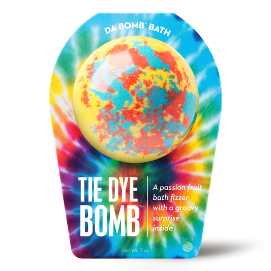 a yellow bath bomb with red and blue dots in tie dye colored packaging 