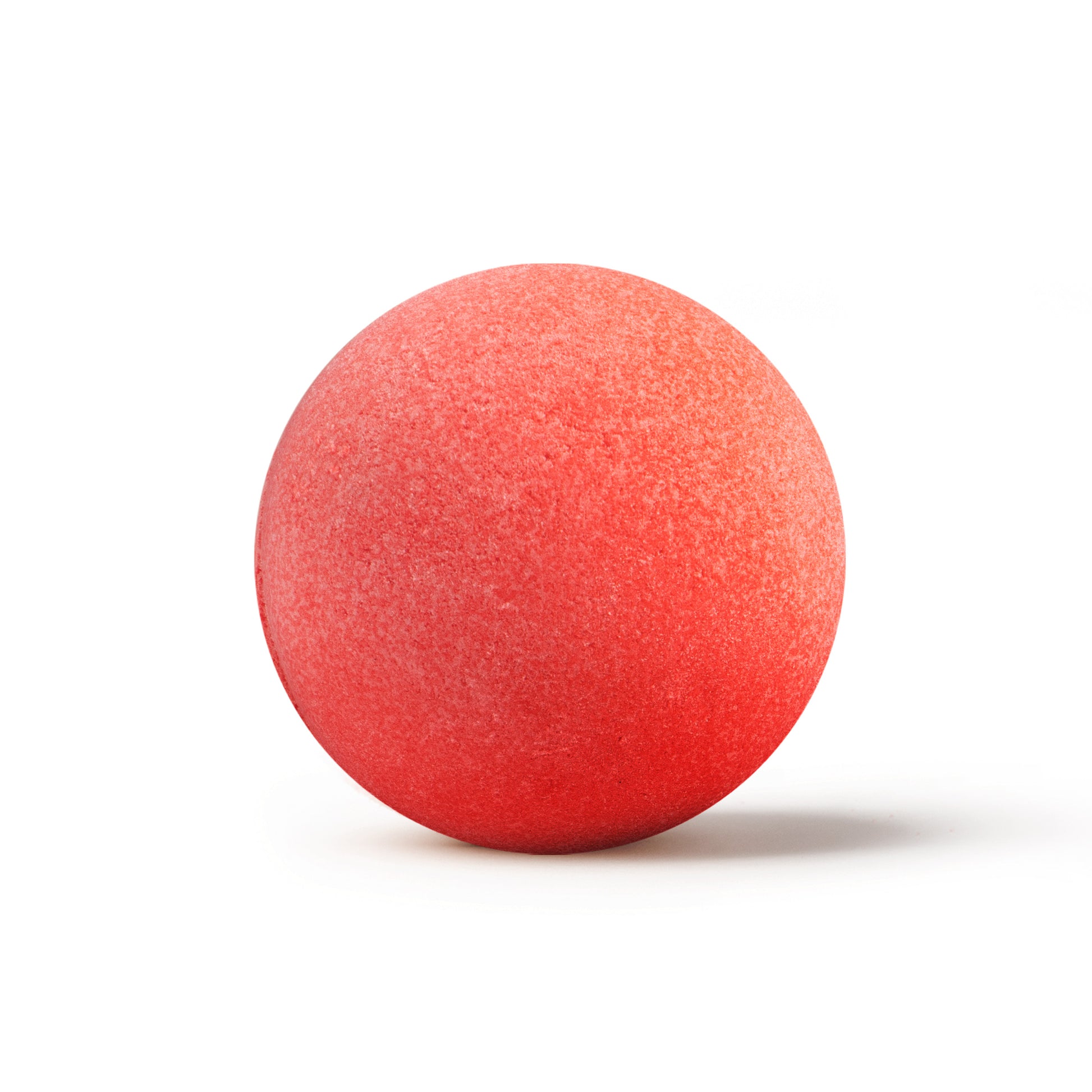 a red bath bomb with shadow