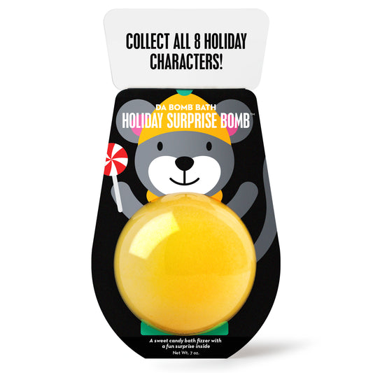 yellow bath bomb in holiday-themed cartoon mouse packaging