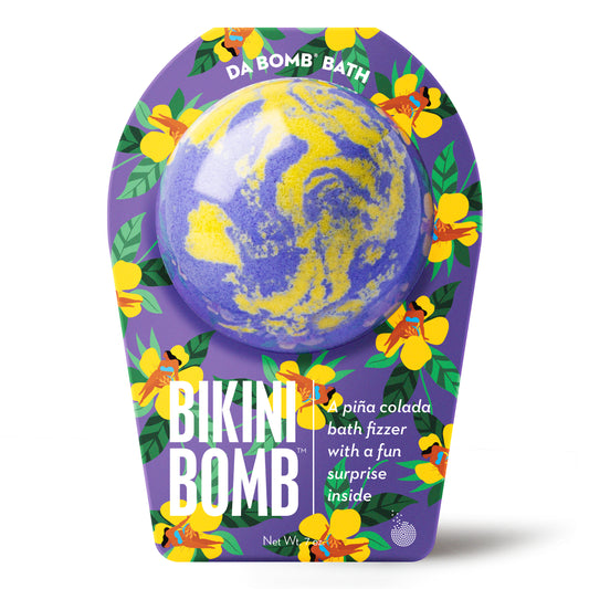 a purple and yellow bath bomb in luaus themed packaging