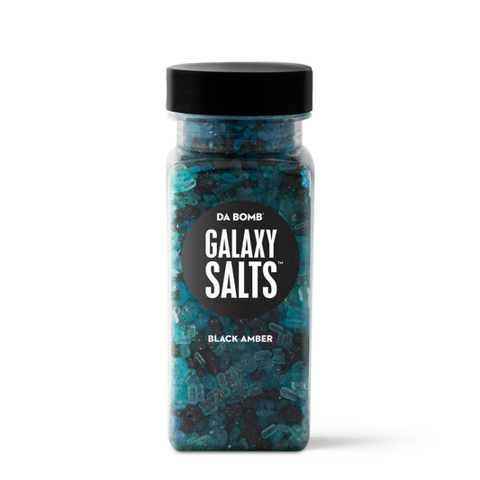 Dark green and black granules in rectangular bottle with black "Galaxy Salts" label