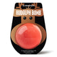 a red bath bomb in a cartoon Rudolph packaging 