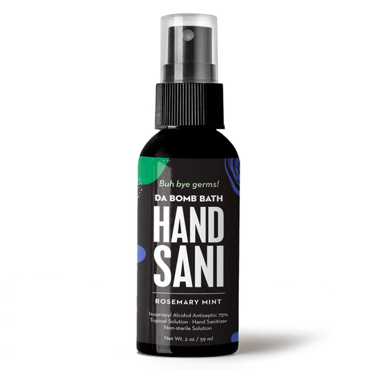 spray bottle of hand sanitizer with green, purple and black label