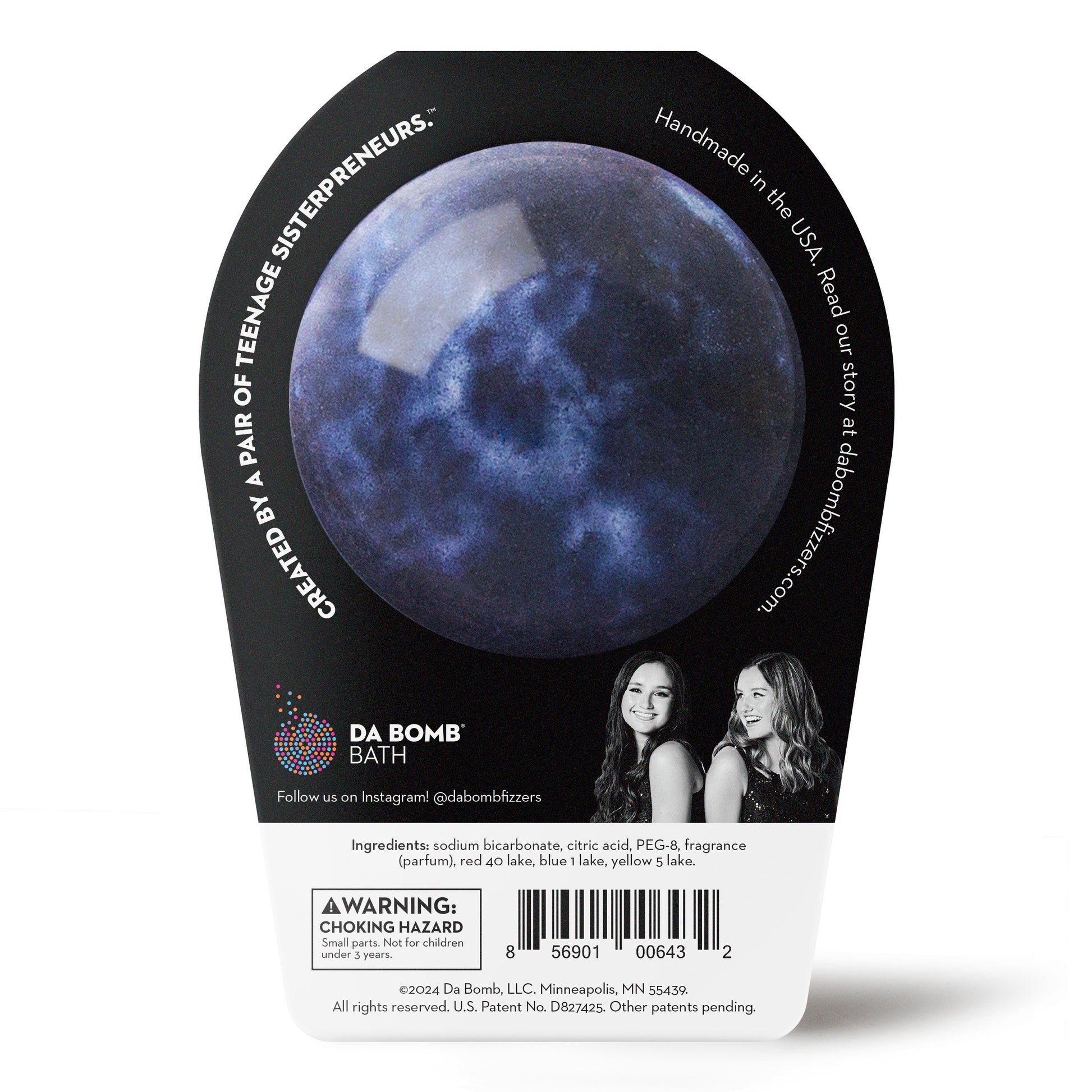 Product photo of a galaxy bath bomb in black packaging by da bomb