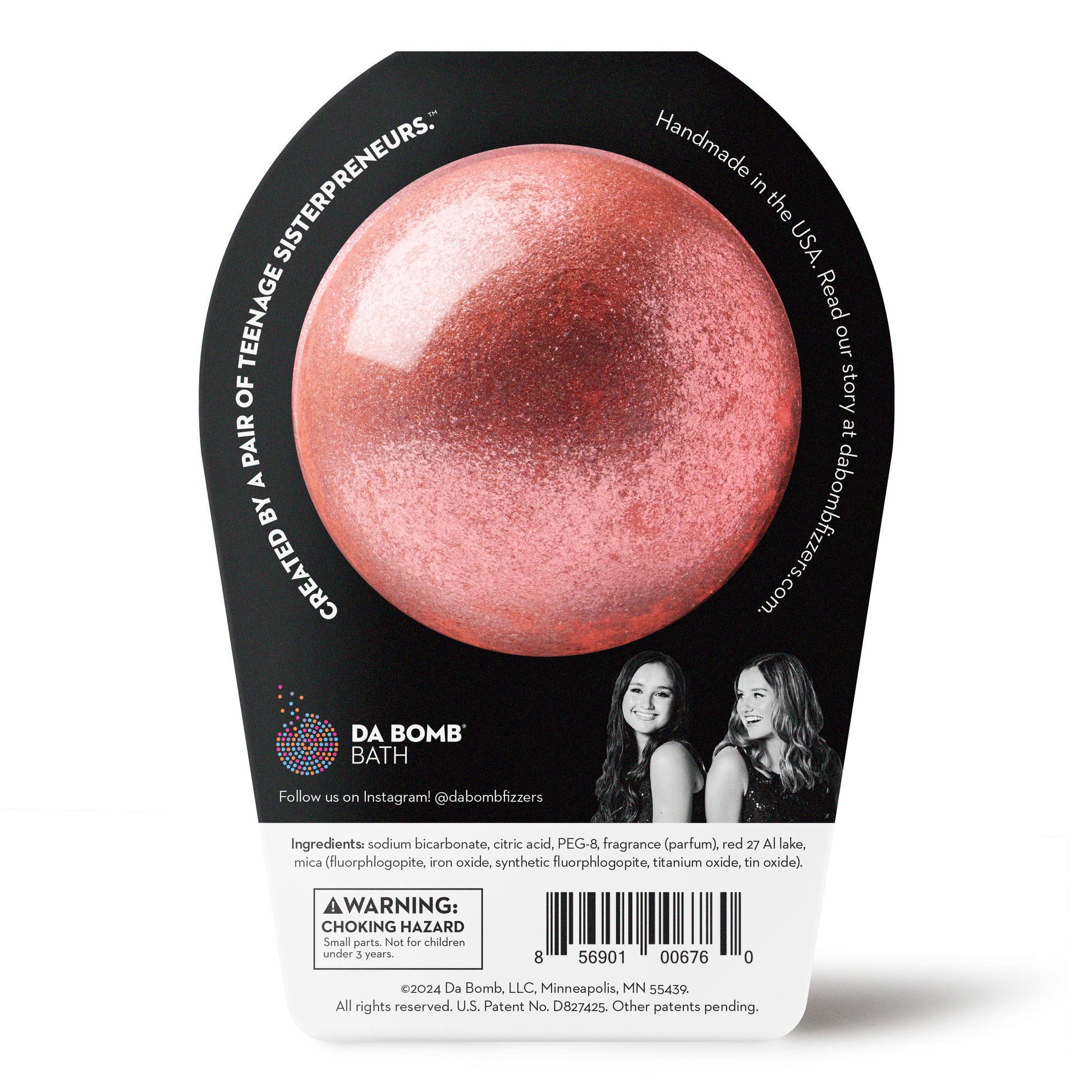 a sparkly pink da bomb bath bomb in black and white packaging