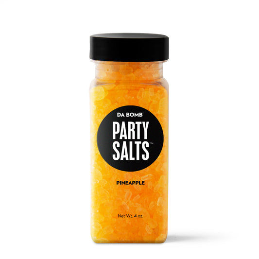 Orange granules in rectangular bottle with black "Party Salts" label