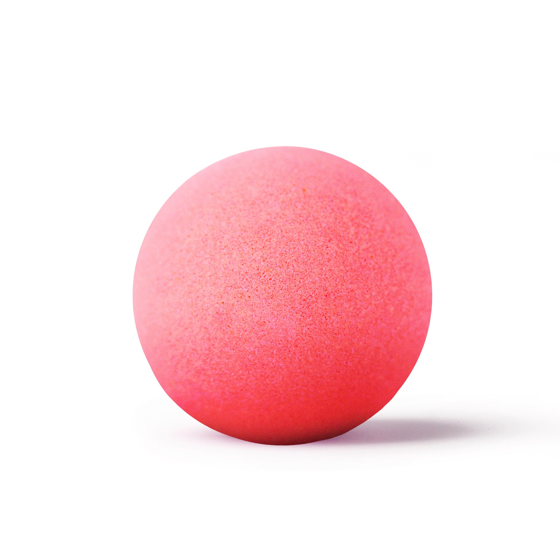 pink bath bomb on white background with shadow