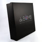 Black gift box with the Da Bomb logo on the front.