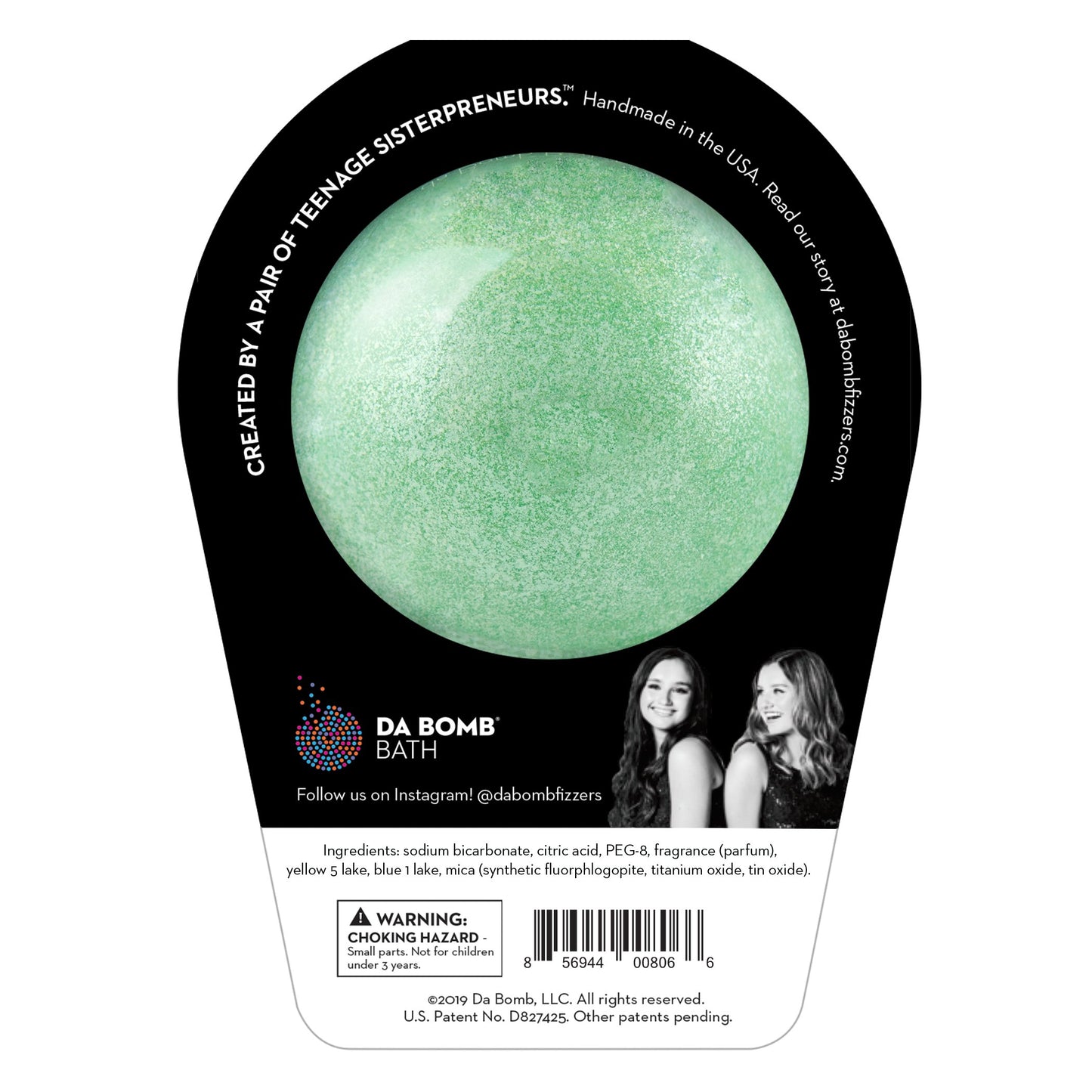 Back of the Jolly bath bomb in packaging. Bath bomb is green shimmer on the back.